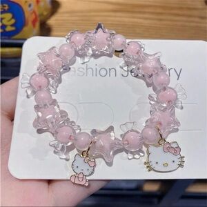 435. NWOT Pink Star Beaded Bracelet with Hello Kitty Charms
